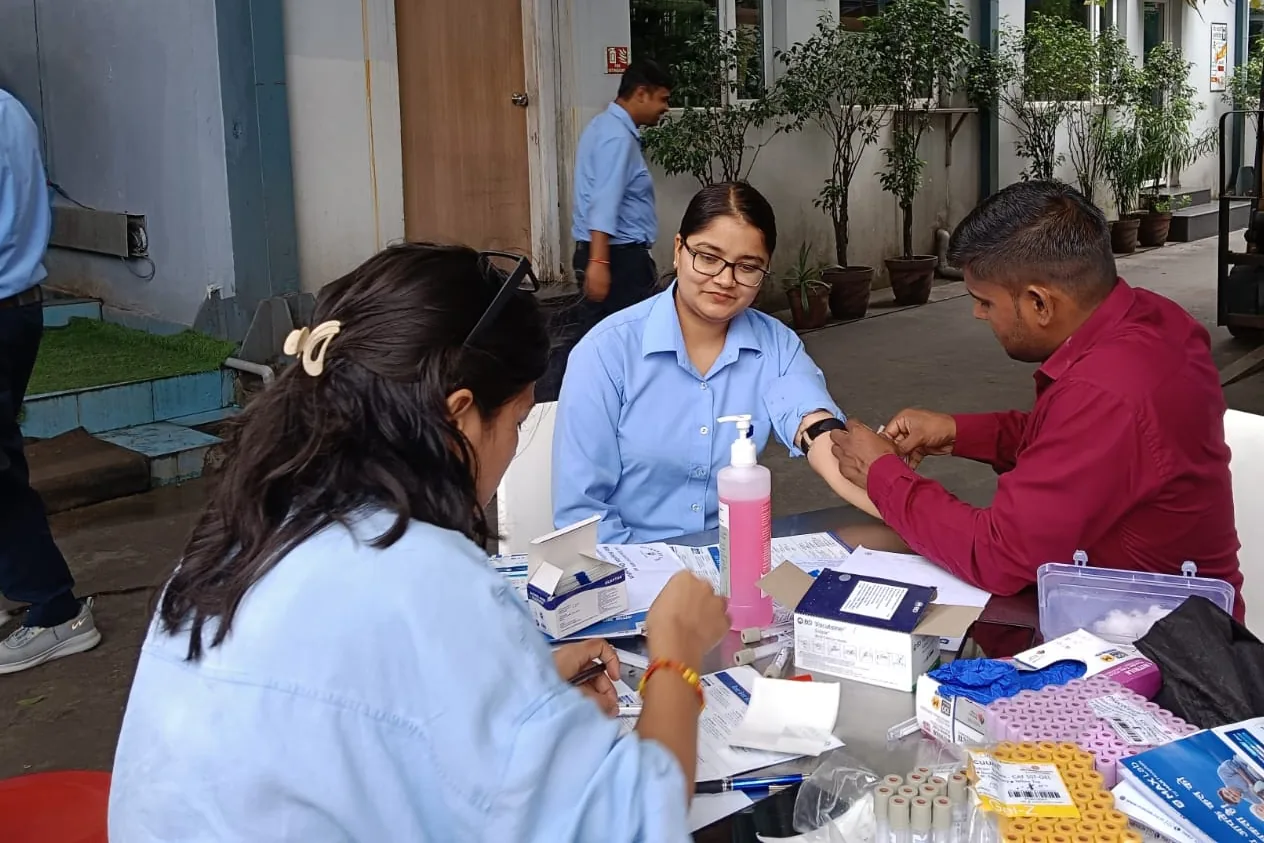A colleague having a health check at the annual health camp