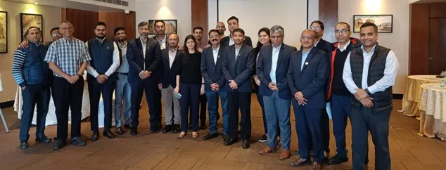 Ennature colleagues together at a company meeting