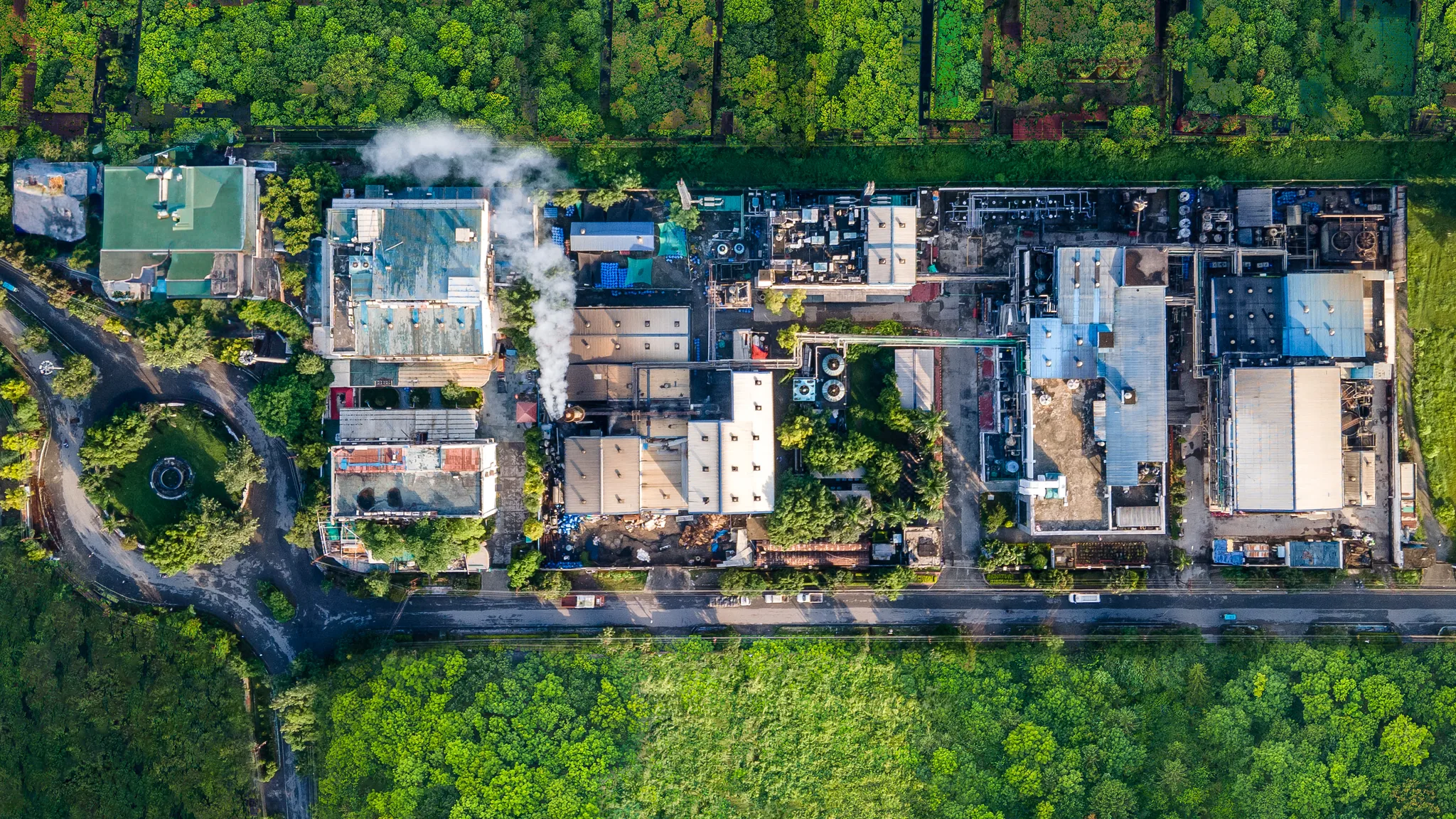 The Ennature site at Dehradun from above, the plant set in green